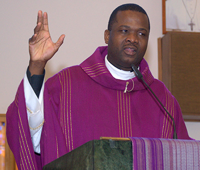 Msgr. Chanel Jeanty preaches at the Black Catholic Mass.