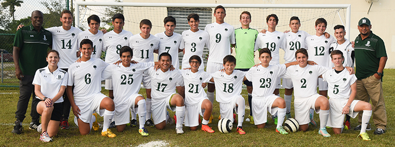 St. Brendan's boys' varsity soccer team: top row, from left: assistant coach Luis Perea, Luis Otero, Tomas Regalado, Sergio Caldera, Edgar Moratino, Erick Quinones, Mauro Braca, Jorge Mahmoud, Julian Quinones, Salvador Malneti, Juan Carlos Bolivar, Jared Stuckert, Gabriel Vazquez and head coach J. C. Manjarres; bottom row, from left: athletic trainer Dyanni Herrera, Anthony Ore, Octavio Gonzalez, Ahn Huang, Alessandro Nepa, Sebastian Tauza, Juanquin Stacey, Michael Hernandez, and Peter Leon.