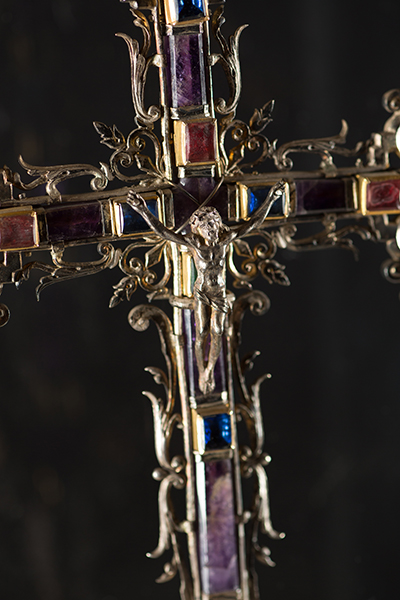 This is the crucifix-shaped reliquary that contains the first-class relic, a finger, of St. Augustine of Hippo, patron saint of the Diocese of St. Augustine. The crucifix is made of silver and adorned with precious stones. The reliquary dates back to 1904, with the name of Pope Pius X inscribed on it.