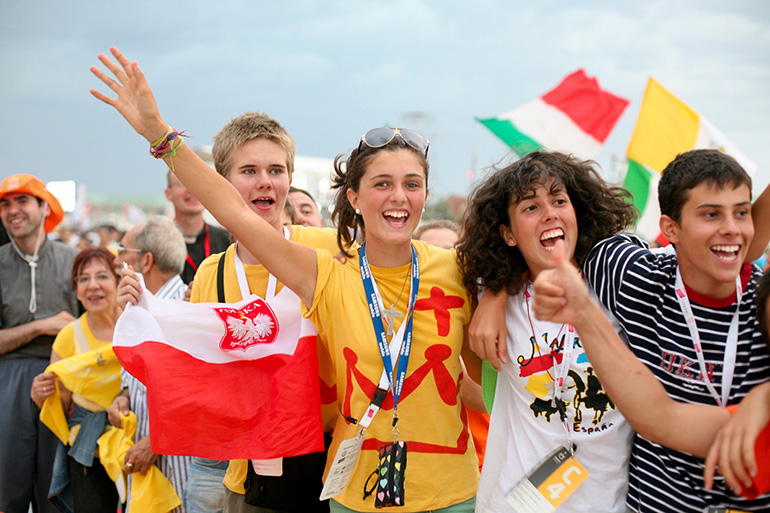 Pilgrims from Poland enjoy waiting for Pope Benedict XVI at the vigil for World Youth Day in Madrid in 2011. In a few months, they will be hosting Pope Francis in their homeland.