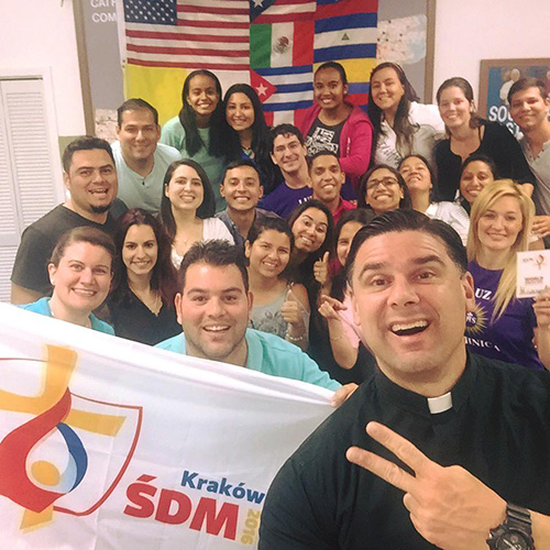 Piarist Father Rafael Capo and Laura Lopez, far left, front, of the U.S. bishops' Southeast Regional Office for Hispanics (SEPI) will be leading a group of Spanish-speaking pilgrims to World Youth Day 2016 as part of the archdiocesan group of 150.