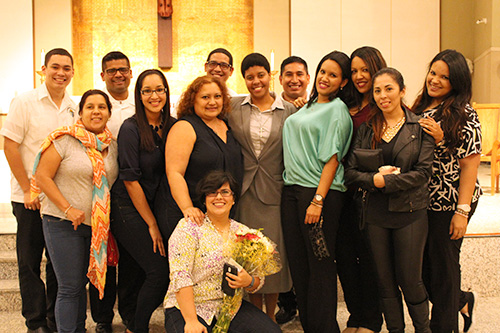 Members of Juventud Peregrina, the young adults group at St. Catherine of Siena which Sister Eridania Reinoso guided for over a year, show their support after her profession of vows.