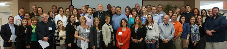 Group photo of the leaders and pastors from nine parishes who took part in the pilot program for training parish missionary disciples, one of the three main goals of the archdiocesan synod.