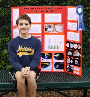 Radioactive particles in the mist: Nativity School sixth grader Andrew DiStefano poses with his science fair project which won first place at the Broward County Science Fair. Andrew will be competing at the Florida State Science and Engineering Fair.