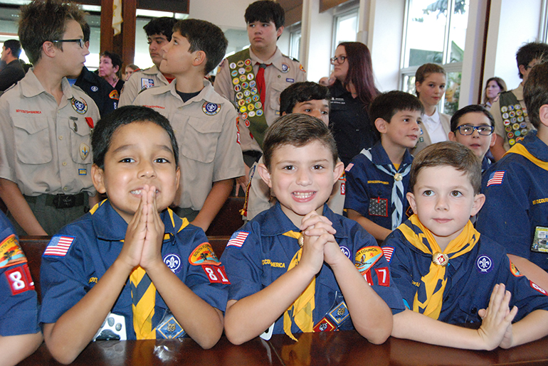 Cub Scouts from one of the parishes get ready to pray at the annual Catholic Scout Awards Mass.