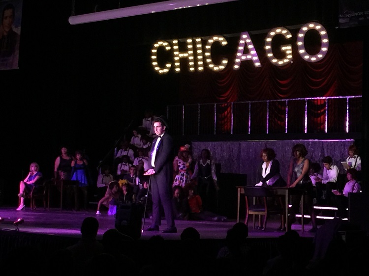 Senior Antonio Rodriguez takes center stage as part of Msgr. Edward Pace High School's production of "Chicago" April 22.