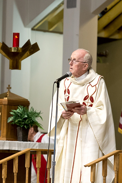 Father Anthony Mulderry speaks during the third annual Mass for people with disabilities in Broward County, celebrated at St. Gabriel Church in Pompano Beach. Father Mulderry is St. Gabriel's pastor.