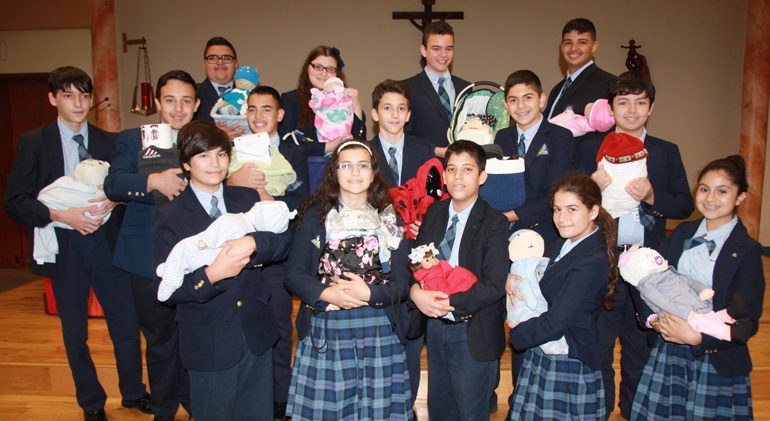 Mother of Our Redeemer School eighth graders learn a lesson in responsibility, selflessness, and parenthood during their "flour babies" week-long school project.