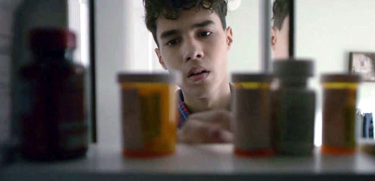 Isaac (Jeffrey Wahlberg) raids his mother's medicine cabinet in the anti-drug film "If Only," being promoted for showings at archdiocesan high schools.