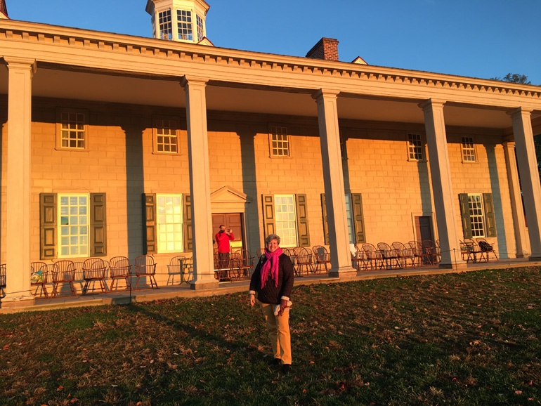 Nativity School teacher Lynne Moore poses by the back porch of Mount Vernon, the Virginia home of  George Washington. In Oct. 2016 Moore was invited to the George Washington Teacher Institute for a hands-on residency program that looked into the life and teachings of George Washington.