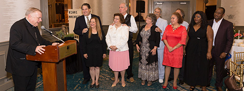 Archbishop Thomas Wenski offers a blessing to married couples after celebrating a closing Mass for the Miami Archdiocesan Council of Catholic Women's annual convention, held at the end of April.