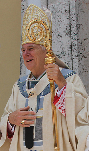 Archbishop Thomas Wenski outside St. Mary Cathedral after ordaining new priests for Miami in 2013.