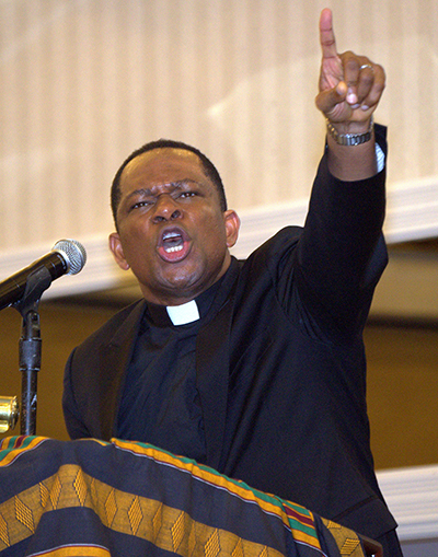 Father Maurice Emelu, a priest of the Diocese of Orlu in Nigeria, speaks during the Interregional African American Catholic Evangelization Conference in Miami.