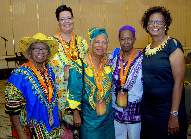 Attendees from the Archdiocese of Miami pose for a photo at the Interregional African American Catholic Evangelization Conference. From left are Dorothy Paul, Tamara Hospedales, Wilhelmina King, Donna Blyden and Virginia Cox.