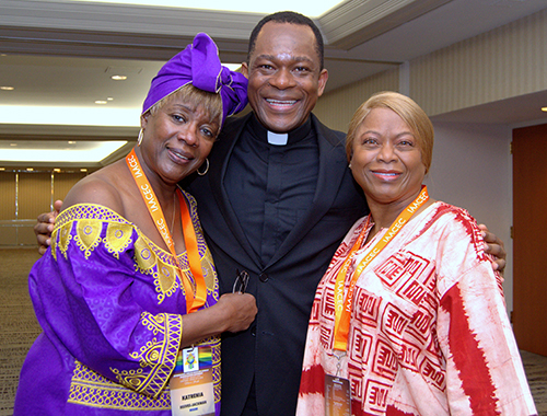 Katrenia Reeves-Jackman, left, poses with Father Maurice Emelu and M. Annette Mandley-Turner, founder of the Interregional African American Catholic Evangelization Conference. Reeves-Jackman directs the Office of Black Catholic Ministry for the Archdiocese of Miami.