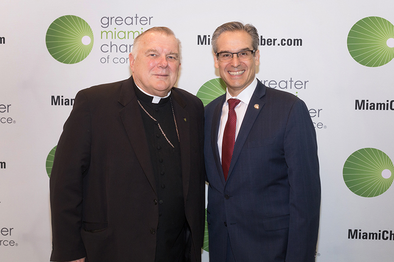 Miami Archbishop Thomas Wenski poses with Alfred Sanchel, president and CEO of the Greater Miami Chamber of Commerce.