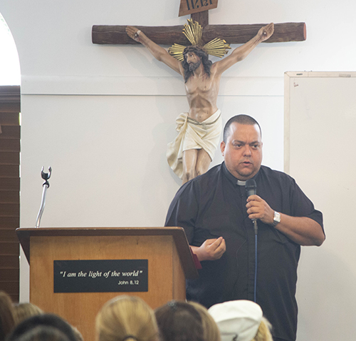 Salesian Father Julio Fernandez-Triana, currently parochial vicar at St. Kevin Church, Miami, leads the first workshop in Spanish at the Office of Lay Ministry's annual Enrichment Day. He spoke on "Liturgy, the art of celebrating the faith of the Church." He stressed that "it's important to know the meaning of what we do."