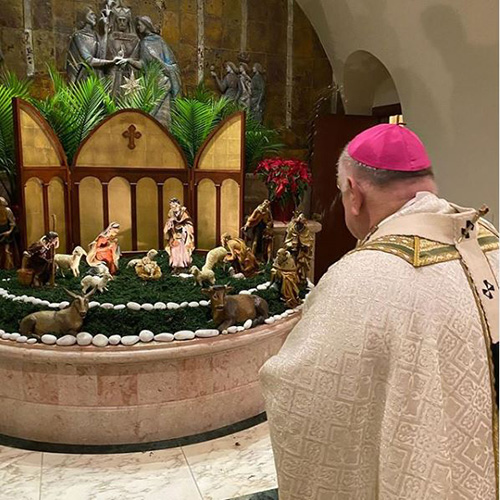 Archbishop Thomas Wenski celebrated the Night Mass for Christmas at 10 p.m. Dec. 24, 2019, at St. Mary Cathedral in Miami. At the conclusion of the Mass, he blessed the cathedral's Nativity.