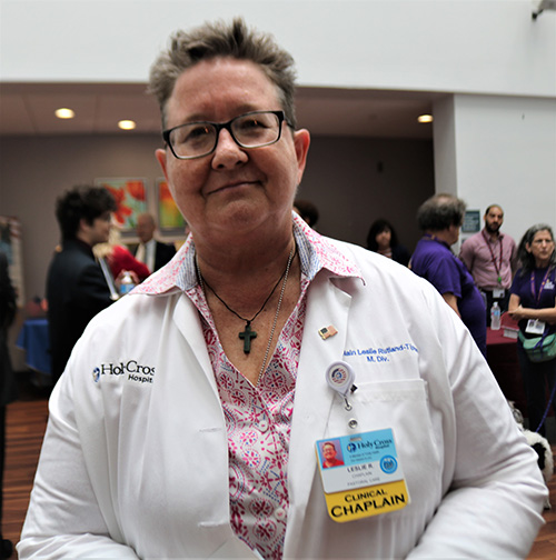 Leslie Rutland-Tipton, Holy Cross Hospital chaplain and former United States Marine Corp officer, greets guests as they arrive March 6, 2020 at Holy Cross Hospital in Fort Lauderdale, for a ceremony launching a unique care program aimed at veterans and active military.