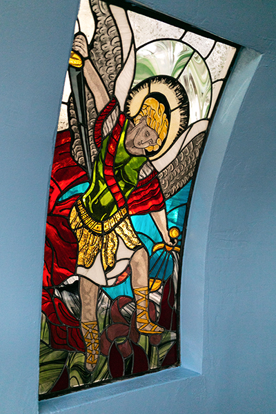 A new stained glass window is seen in the renewed grotto inaugurated at San Isidro Church in Pompano Beach, Dec. 8, 2020, feast of the Immaculate Conception.