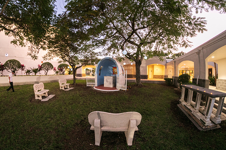 View of the renewed grotto and prayer area at San Isidro Mission in Pompano Beach, dedicated Dec. 8, 2020, the feast of the Immaculate Conception. Both the grotto environs and the statue were refurbished this year by parishioners, and Father Wilfredo Contreras, pastor of San Isidro, led the events.