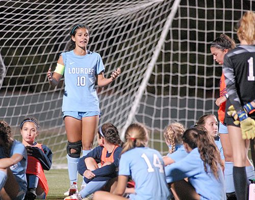 Lourdes senior defender Alexa Sanchez talks to the Bobcats during halftime of Our Lady of Lourdes Academy's 0-0, 3-1 penalty-kicks loss to Venice, March 5, 2021 in the FHSAA Class 6A Girls Soccer Championship Game at Spec Martin Stadium in DeLand.