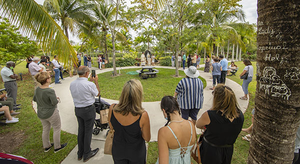 Faithful gather and pray the rosary around the Mary Grotto at MorningStar Renewal Center in Pinecrest.  The ceremony was part of the Father's Day rosary and eucharistic procession held June 19, 2021.