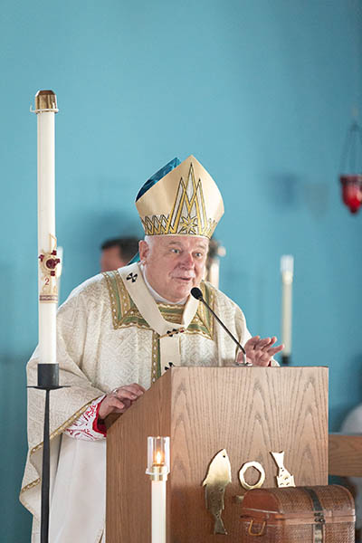 Archbishop Thomas Wenski gives his homily at the new St. Peter the Fisherman Church in Big Pine Key during the dedication Mass Sept. 25, 2021.  The newly completed church, parish hall and priests residence in the Lower Florida Keys replace the old facility which was mostly destroyed by 2017's Hurricane Irma.