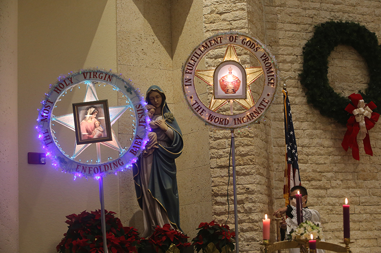 Parols, or Christmas candles, adorn the altar of St. Bonaventure Church in Davie on the final night of Simbang Gabi, Dec. 23, 2021.