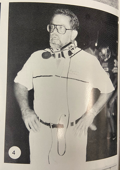 Yearbook photo of St. Thomas Aquinas' longtime athletic director and football coach, George Smith.