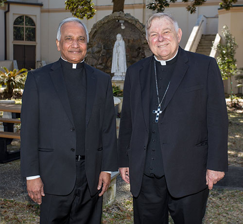 Archbishop Thomas Wenski poses with Father Jose Kallukalam, pastor of St. Michael the Archangel Parish in Fernandina Beach, which was marking its 150th anniversary. The archbishop celebrated the closing Mass for their anniversary year Feb. 20, 2022.