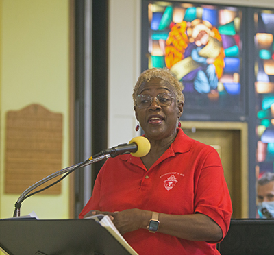 Katrenia Reeves-Jackman, director of the archdiocesan Office of Black Catholics, speaks at the conclusion of the annual Unity Mass, celebrated by Archbishop Thomas Wenski at St. Helen Church, Lauderdale Lakes, Aug. 21, 2022.