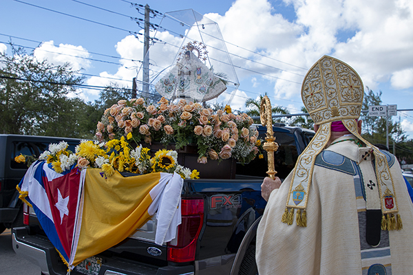 Making her rounds through the city before her feast day, the image of Our Lady of Charity made a final stop at St. Mary Cathedral, where Archbishop Thomas Wenski went out to pay his respects before celebrating the Mass marking his 25th anniversary as a bishop, Sept. 3, 2022.