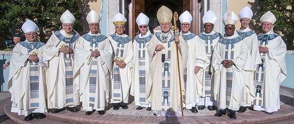 Nearly a dozen bishops along with dozens of local priests, religious and laity gathered at St. Mary Cathedral Sept. 3, 2022, to join Archbishop Thomas Wenski in celebrating the 25th anniversary of his ordination as a bishop. From left: Bishop Peter Baldacchino, former auxiliary bishop of Miami and now bishop of Las Cruces, New Mexico; Bishop Gerald Barbarito of Palm Beach; Bishop Silvio Baez, auxiliary of Managua, Nicaragua, currently exiled in Miami; Archbishop Charles Dufour, emeritus of Kingston, Jamaica; Bishop John Noonan, former Miami auxiliary and now bishop of Orlando; Bishop Frank Dewane of Venice; Archbishop Patrick Pinder of Nassau, Bahamas; Bishop Quesnel Alphonse of Fort-Liberté, Haiti; Bishop William Wack of Pensacola-Tallahassee; and Bishop Fernando Isern, a South Florida priest and now retired bishop of Pueblo, Colorado.