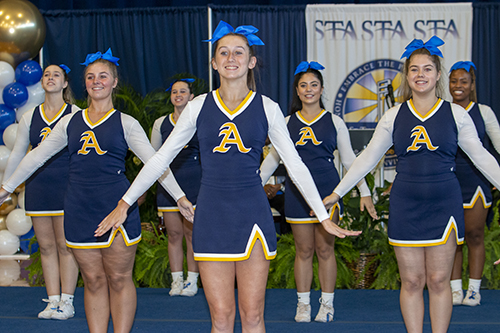 Cheerleaders lead St. Thomas Aquinas' celebration of its 2022 Blue Ribbon designation as an Exemplary High Performing High School, Oct. 3, 2022.