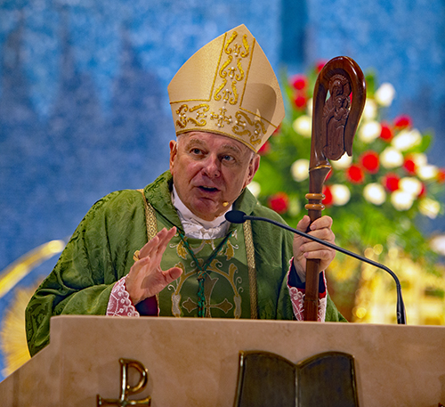 Archbishop Thomas Wenski preaches the homily at the Mass that kicked off St. Rose of Lima Parish's 75th anniversary celebration, held Oct. 9, 2022 at the Miami Shores church.