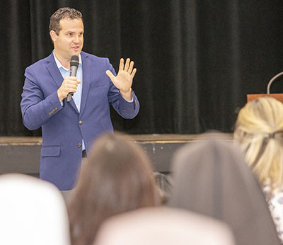 Joshua Danis, national director for Alpha USA, delivers the keynote address at Bridging the Gap, a professional development day that brought around 250 parish staff members, volunteers, school principals and priests to Msgr. Edward Pace High School in Miami Gardens, Oct. 11, 2022.