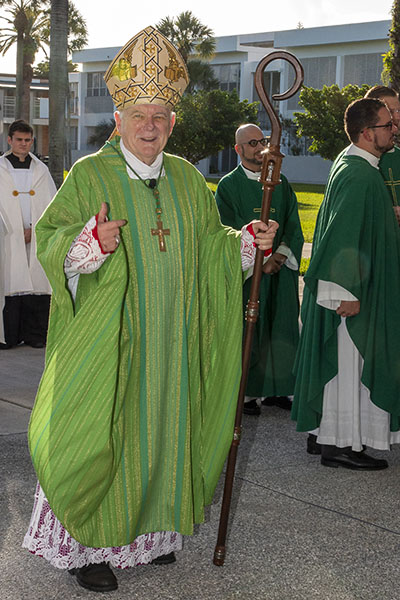 Archbishop Thomas Wenski prepares to celebrate the opening Mass of the annual Catechetical Conference, which brought around 600 religious education and Catholic school teachers to St. Brendan High School, Oct. 29, 2022.