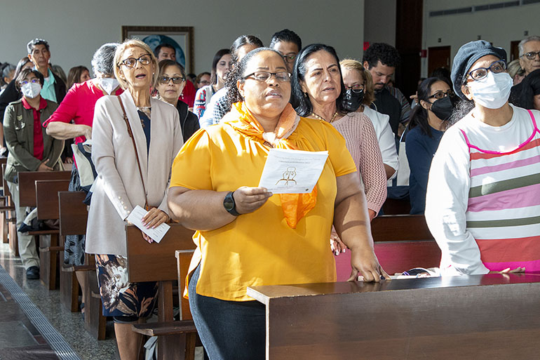 Some of the 600 catechists present take part in the opening Mass of the annual Catechetical Conference, held at St. Brendan High School, Oct. 29, 2022.