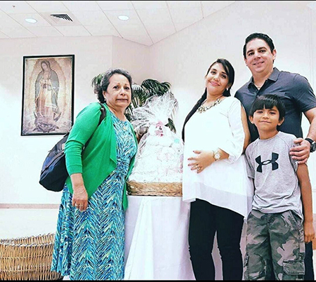 At the time pregnant with her daughter, Genesis, Luz Alba and her husband Ivanovich Alba made several event presentations for the Respect Life ministry in different archdiocesan parishes. They are pictured with Evalina Van Lengen, former administrator of the now-closed North Broward Pregnancy Help Center, and their son Angel Alba.