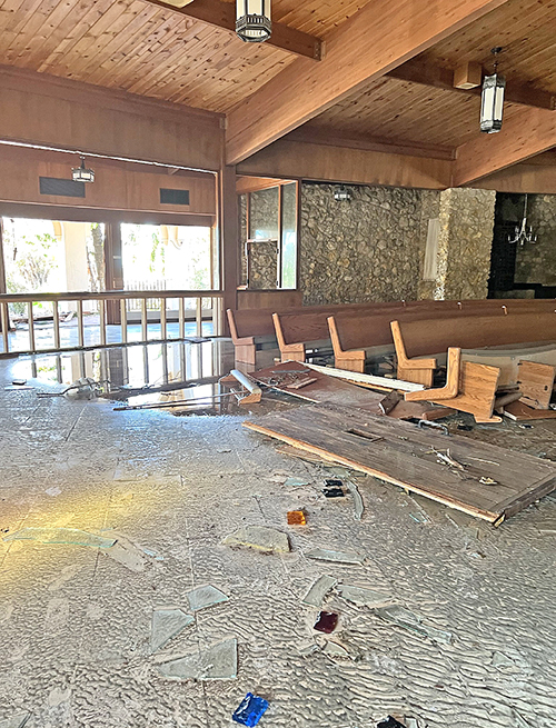 The pews inside Ascension Parish church were pushed to the side by the storm surge during Hurricane Ian on Fort Myers Beach as seen Oct. 1, 2022.