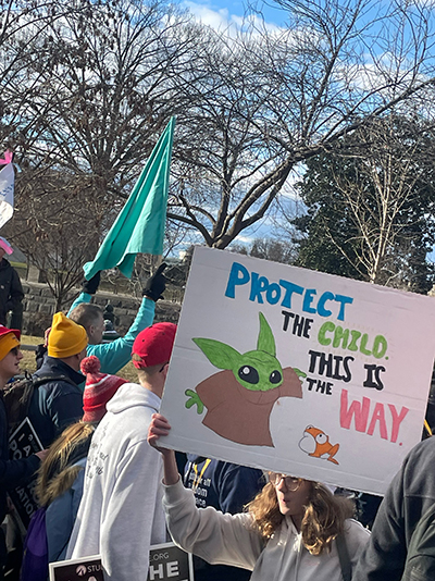 One of the messages carried by marchers at the March for Life, where over 90 young people from Miami took part Jan. 20, 2023. They traveled to Washington, D.C., Jan. 18-21. The pilgrimage was led by Stephen Colella, director of the Office of Parish Life, and Father Manny Alvarez, pastor of the Church of the Little Flower in Coral Gables.