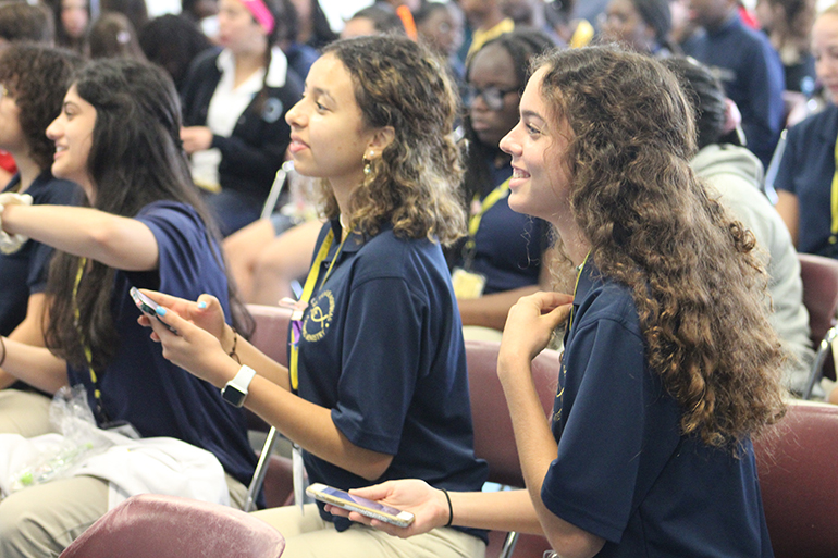 Students from St. Thomas Aquinas High and other Archdiocese of Miami high schools play a round of the online trivia game Kahoot! during a kick-off gathering for the National Eucharistic Revival at St. Thomas University in Miami Gardens, March 22, 2023.