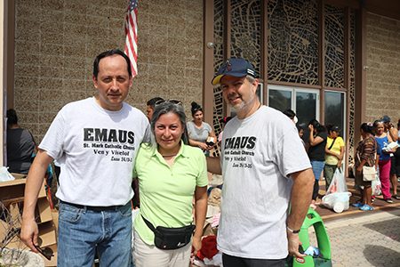 From left, Alexander and Luz Durán and Tino Corcini, members of the Emmaus group from St. Mark Parish in Southwest Ranches and St. Katharine Drexel Parish in Weston, brought donations of food, toiletries and clothing to St. Jerome, in Fort Lauderdale, on April 22, 2023, to help the community near the parish that was affected by the floods.