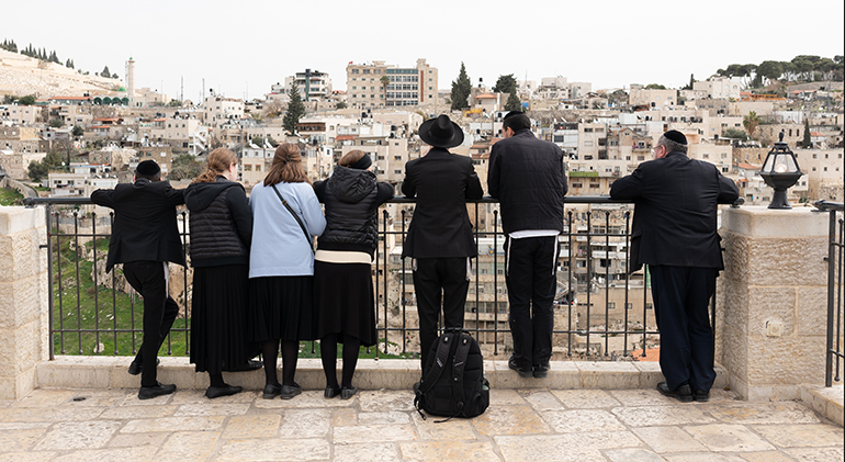 Visitors look out into the City of David National Park in  Jerusalem.