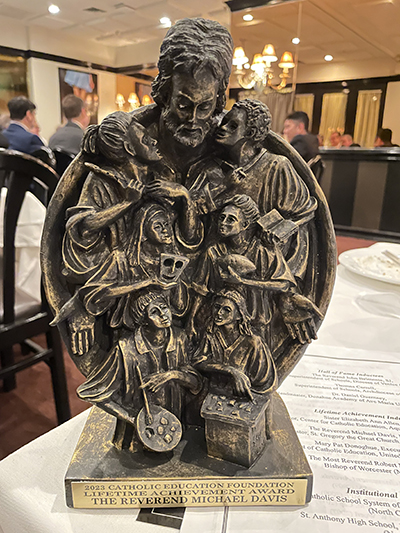 Image of the Lifetime Achievement Award given to Father Michael Davis, pastor of St. Gregory the Great Parish in Plantation, by the Catholic Education Foundation, at a ceremony in New York, April 26, 2023.