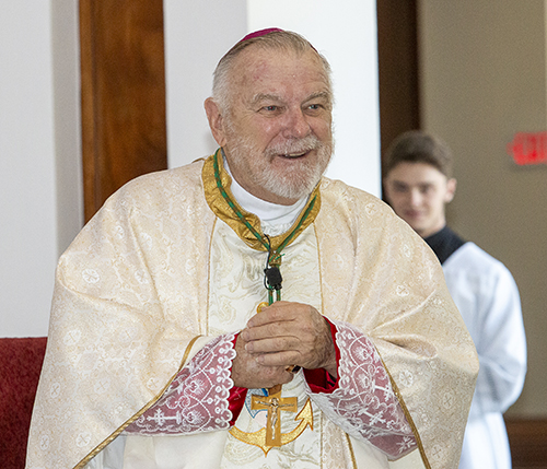 Archbishop Thomas Wenski speaks at St. Raphael Chapel at St. John Vianney College Seminary in Miami while celebrating Mass during the all-principals meeting held before the start of the 2023-24 school year, Aug. 4, 2023, at St. Brendan High School next door.