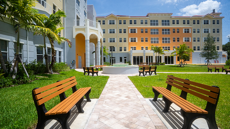 Exterior view of Casa Sant'Angelo, a 113-apartment affordable housing community for people aged 62 and over, which is located next to St. John XXIII Church in Miramar and was dedicated Aug. 11, 2023.