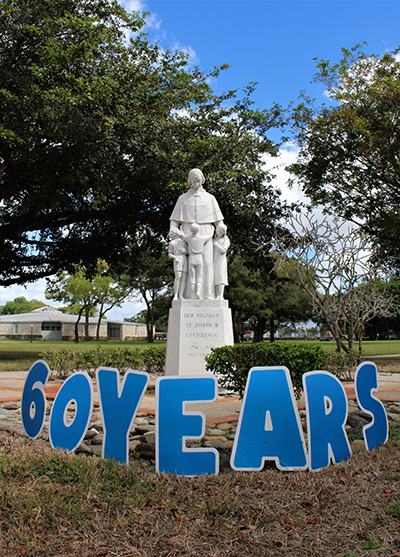 A statue of St. Joseph Benedict Cottolengo surrounded by children adorns the grounds at the Marian Center in Miami Gardens. The Marian Center School and Services is currently celebrating their 60th anniversary.