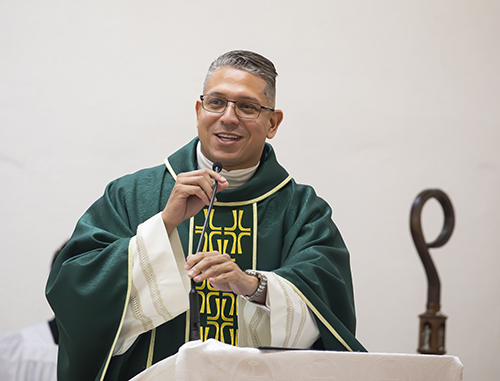Father Yonhatan Londoño, administrator of St. Benedict Church in Hialeah, gives closing remarks during the parish’s 50th anniversary celebration, Sept. 23, 2023.